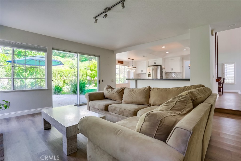 26511 Maside Mission Viejo, CA 92692 - Photo 14 of 46 a living room with furniture and a large window