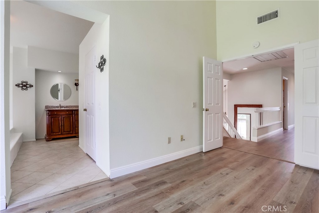 26511 Maside Mission Viejo, CA 92692 - Photo 22 of 46 a view of a room with wooden floor and cabinet