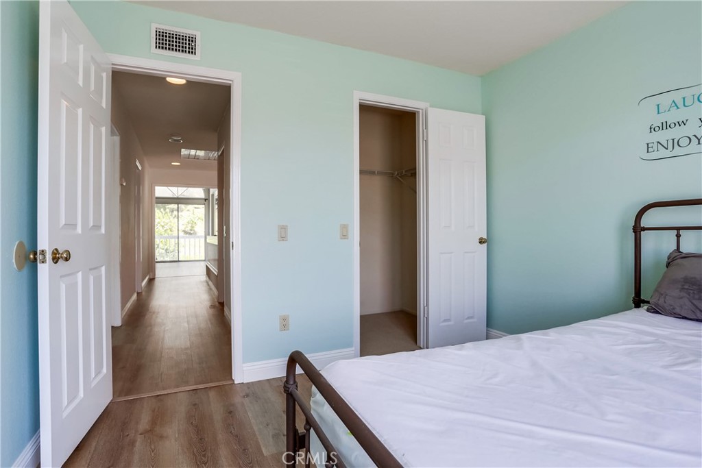 26511 Maside Mission Viejo, CA 92692 - Photo 27 of 46 a bedroom with a bed and a table