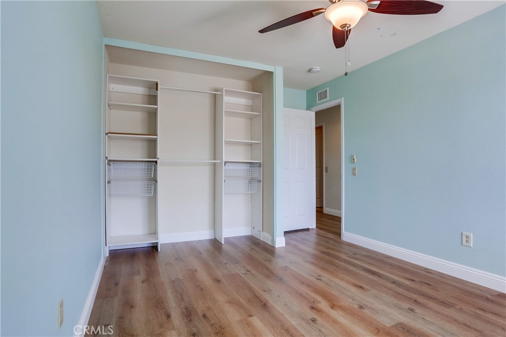 26511 Maside Mission Viejo, CA 92692 - Photo 31 of 46 a view of an empty room with a window and wooden floor