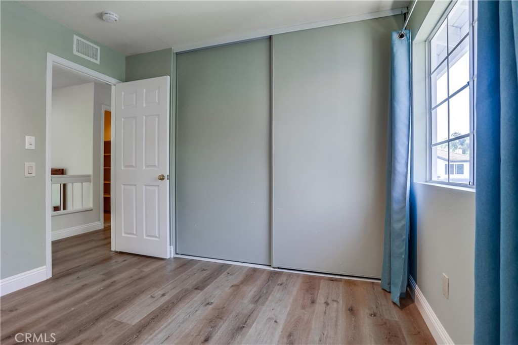 26511 Maside Mission Viejo, CA 92692 - Photo 33 of 46 a view of an empty room with wooden floor and a window