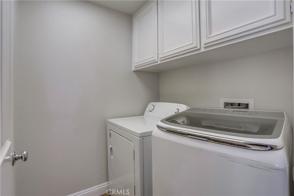 26511 Maside Mission Viejo, CA 92692 - Photo 34 of 46 a utility room with dryer and washer