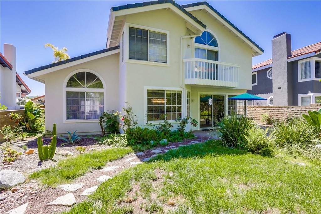 26511 Maside Mission Viejo, CA 92692 - Photo 36 of 46 a front view of a house with garden