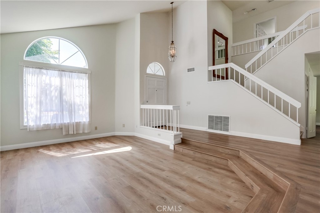 26511 Maside Mission Viejo, CA 92692 - Photo 4 of 46 a view of an entryway with wooden floor