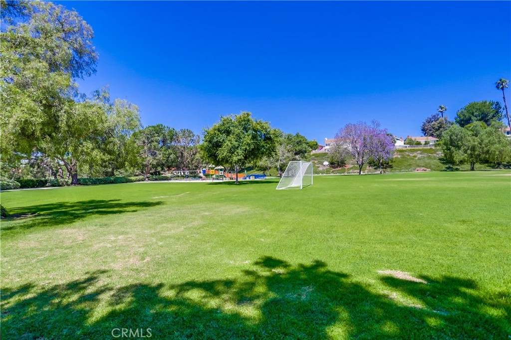 26511 Maside Mission Viejo, CA 92692 - Photo 42 of 46 a view of a grassy field with trees in the background