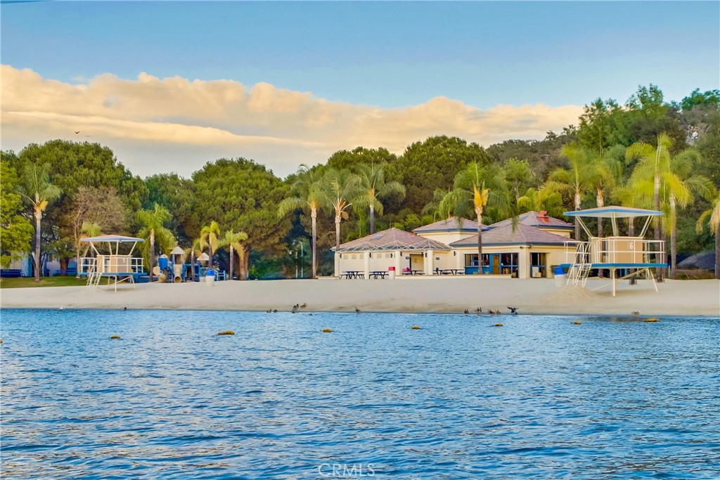 26511 Maside Mission Viejo, CA 92692 - Photo 43 of 46 a view of a white house next to a yard with lawn chairs