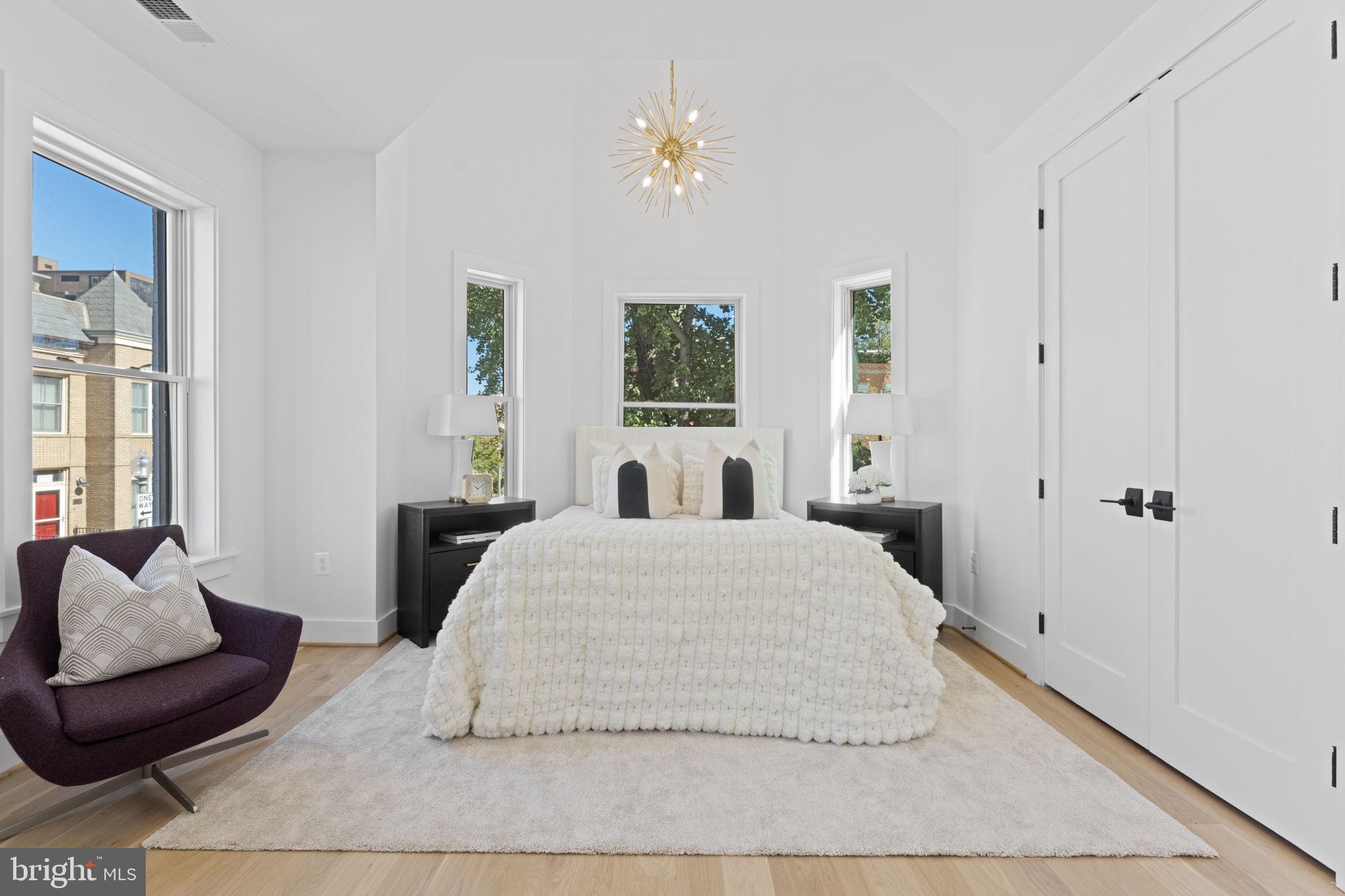 600 U Street Northwest Washington, DC 20001 - Photo 23 of 54 a spacious bedroom with a bed and a couch