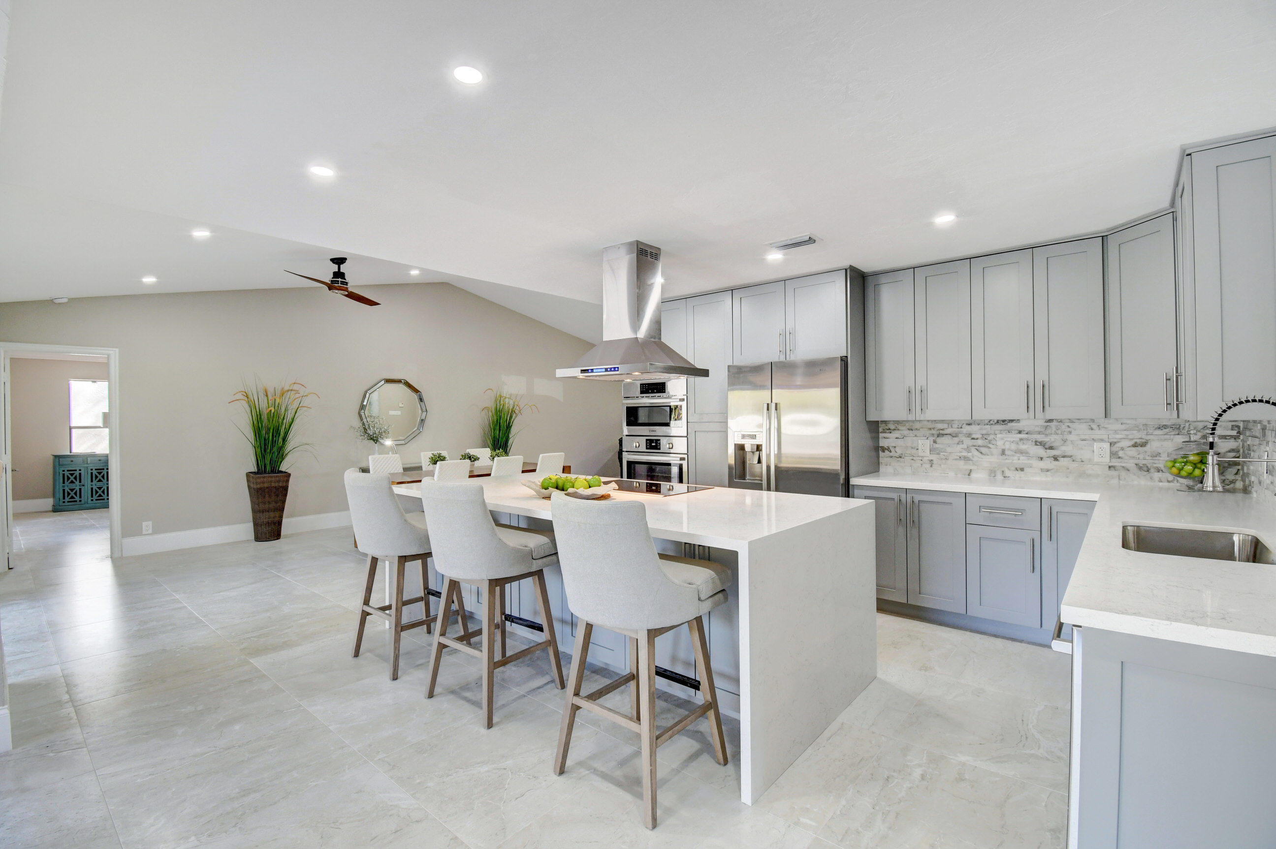 9305 Perth Road Lake Worth, FL 33467 - Photo 1 of 67 Kitchen with waterfall island