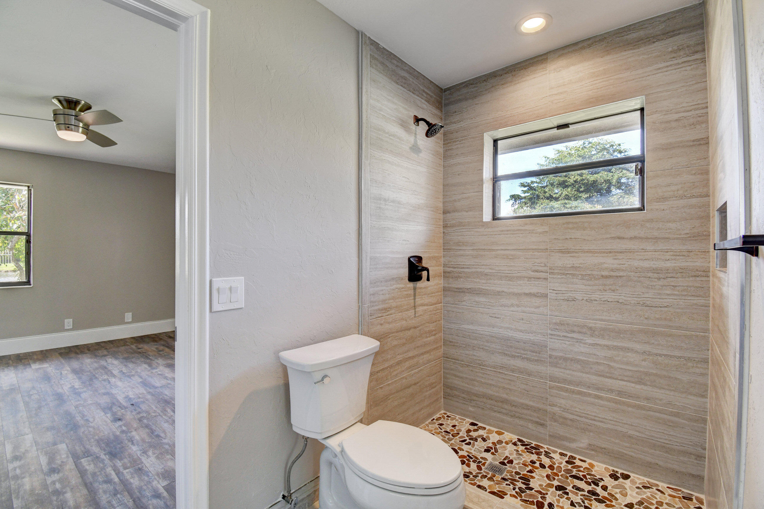 9305 Perth Road Lake Worth, FL 33467 - Photo 42 of 67 Jack and Jill shower