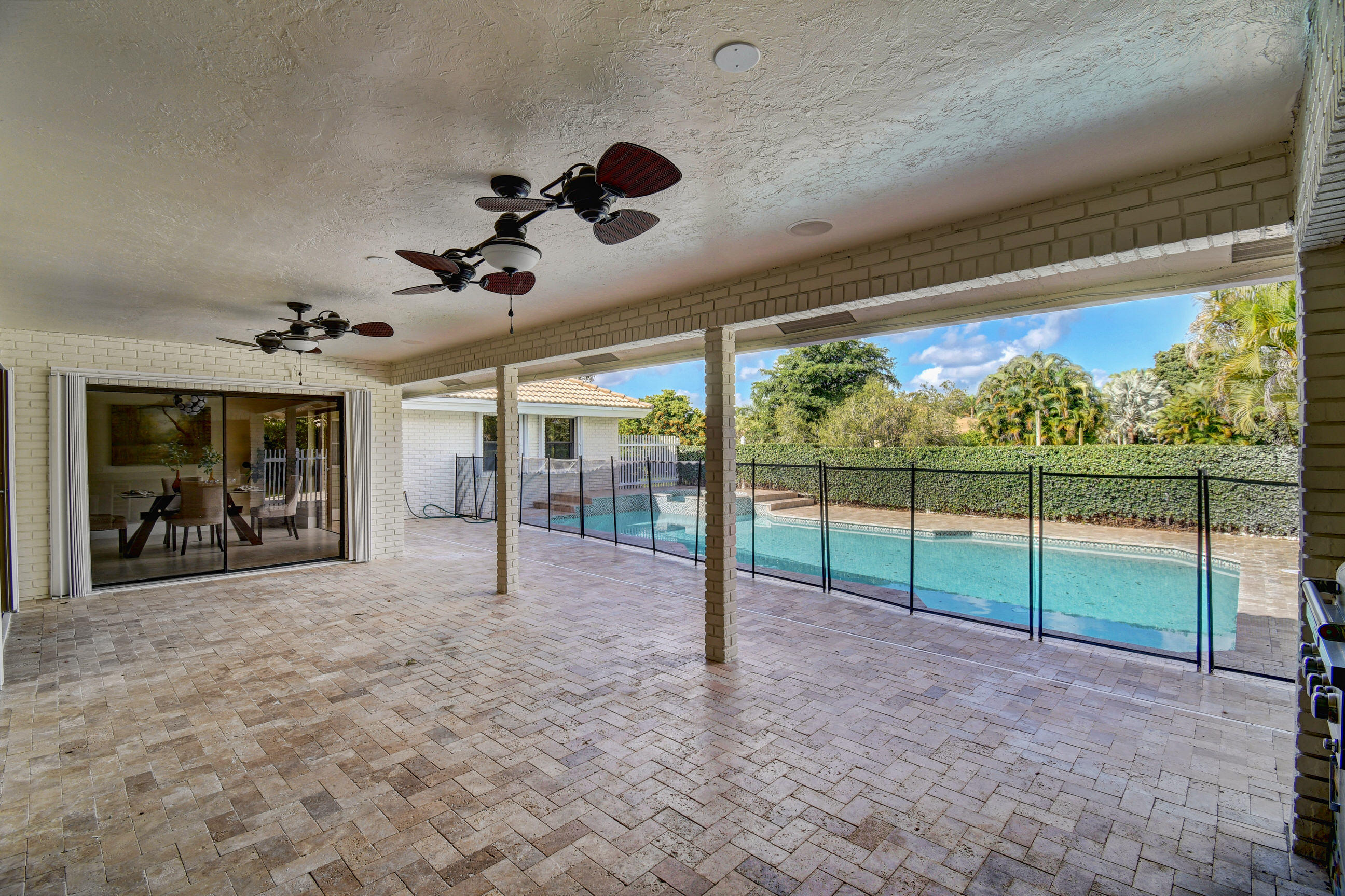 9305 Perth Road Lake Worth, FL 33467 - Photo 56 of 67 Screen fence around pool