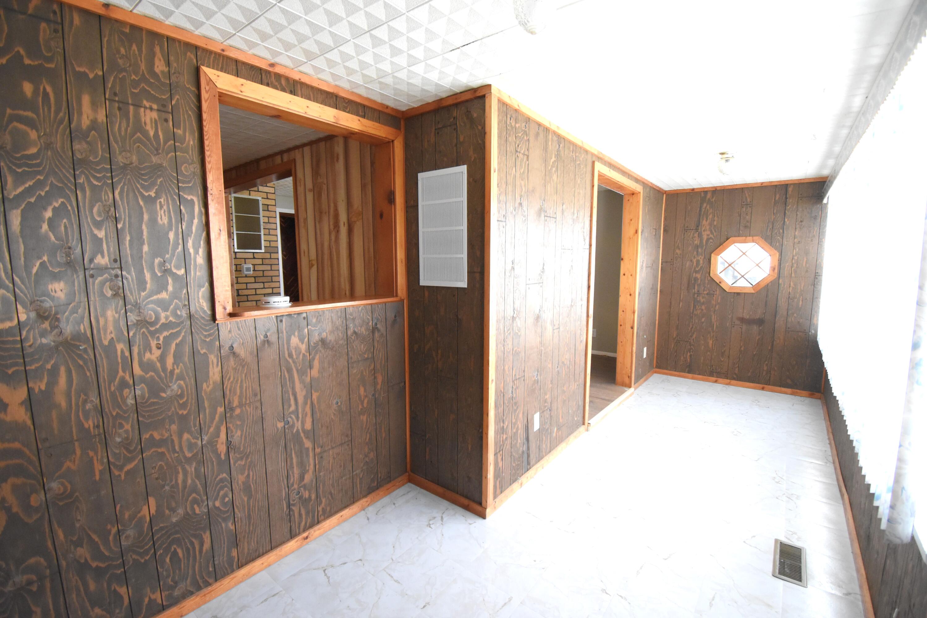 720 North Jefferson Street Rensselaer, IN 47978 - Photo 11 of 49 a view of a livingroom with a staircase