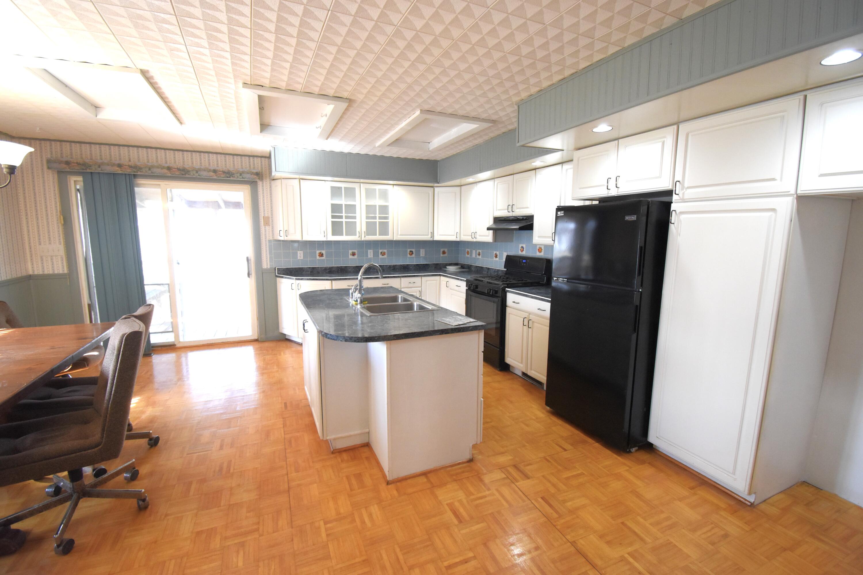 720 North Jefferson Street Rensselaer, IN 47978 - Photo 25 of 49 a kitchen with stainless steel appliances granite countertop a refrigerator a sink a stove and a refrigerator