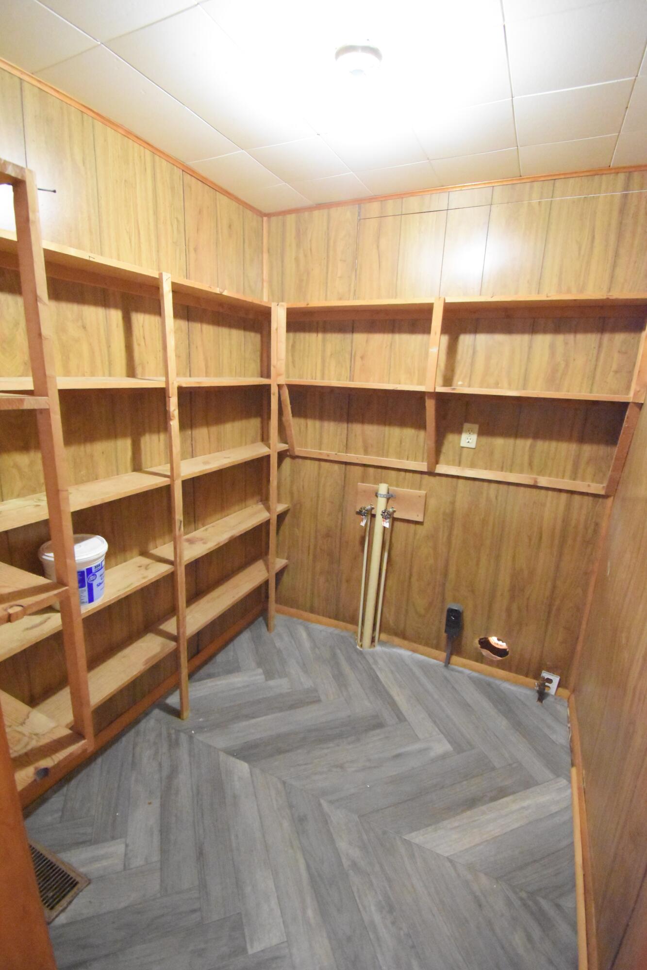 720 North Jefferson Street Rensselaer, IN 47978 - Photo 31 of 49 a view of a room with wooden shelves