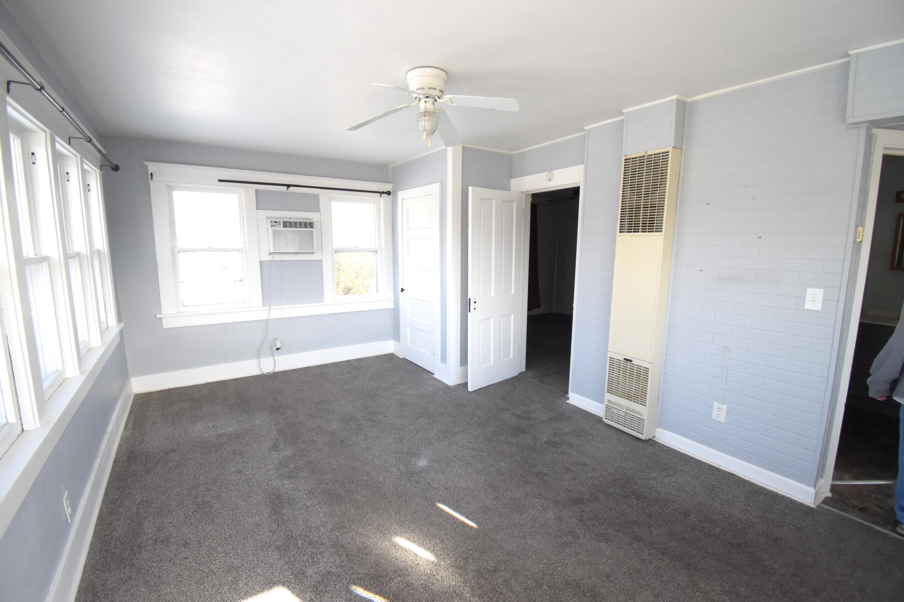 720 North Jefferson Street Rensselaer, IN 47978 - Photo 35 of 49 a view of empty room with a fireplace
