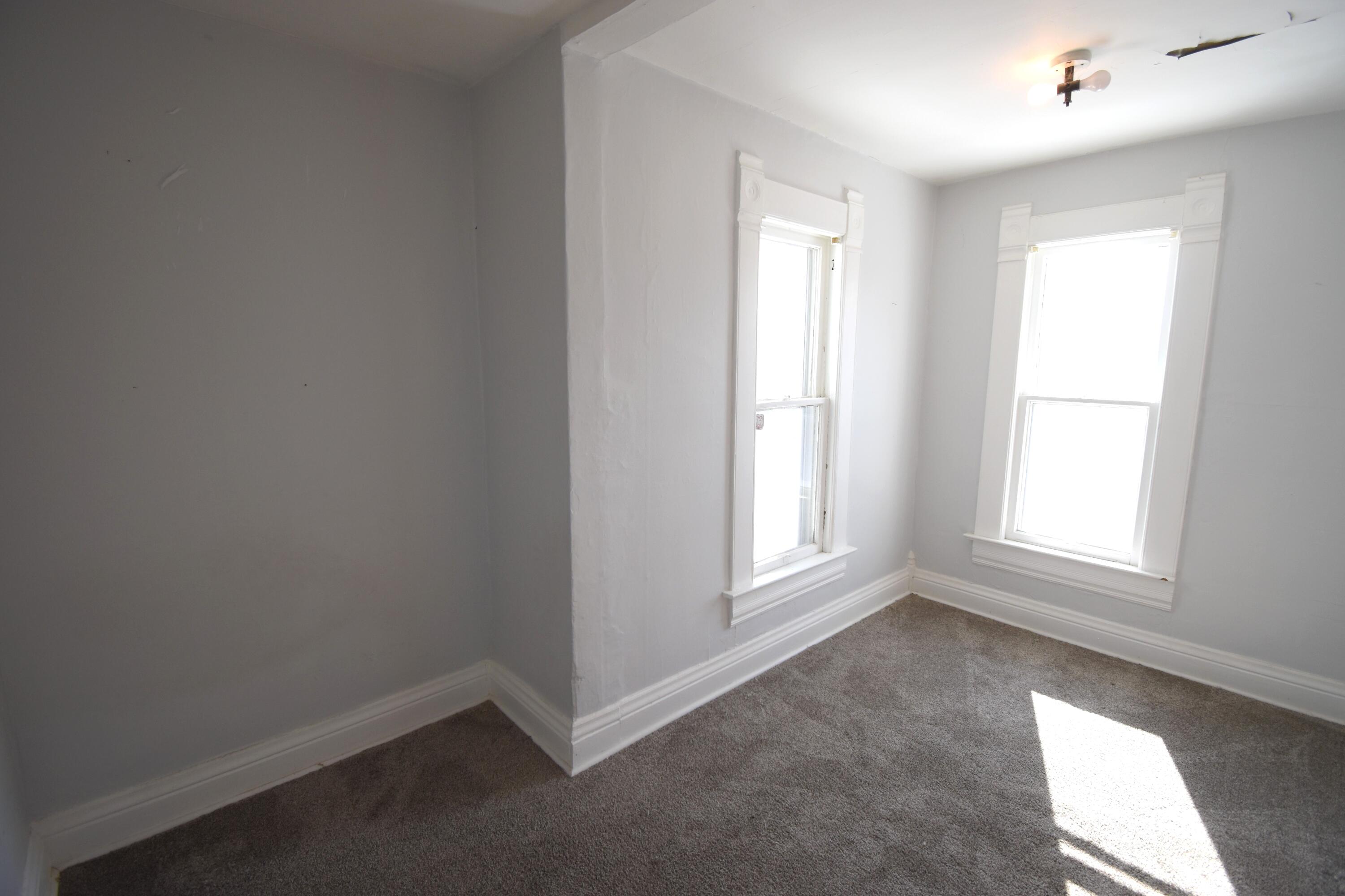 720 North Jefferson Street Rensselaer, IN 47978 - Photo 42 of 49 an empty room with a window