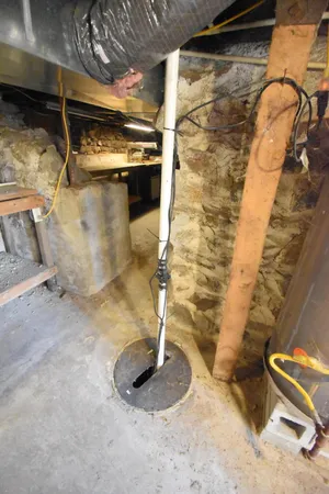 a view of wooden floor and windows in a room
