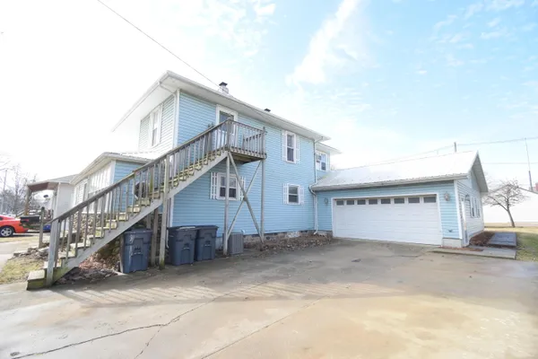 a view of a house with a park