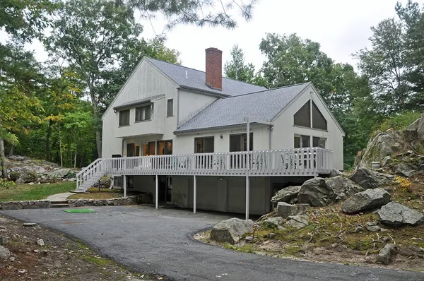 a front view of a house with a porch