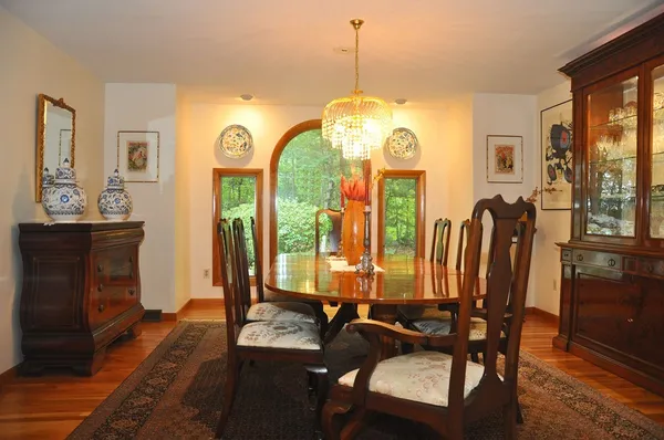 a view of a dining room with furniture window and outside view