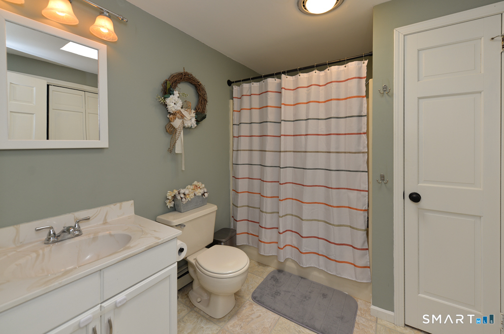 109 Harrison Lane Bethlehem, CT 06751 - Photo 22 of 28 a bathroom with a toilet sink and shower
