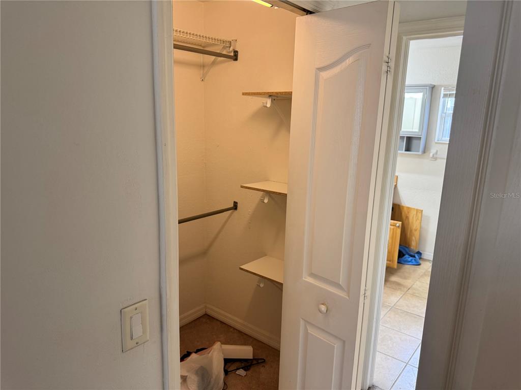 12055 Robina Road Weeki Wachee, FL 34614 - Photo 27 of 64 a bathroom with a shower and a toilet