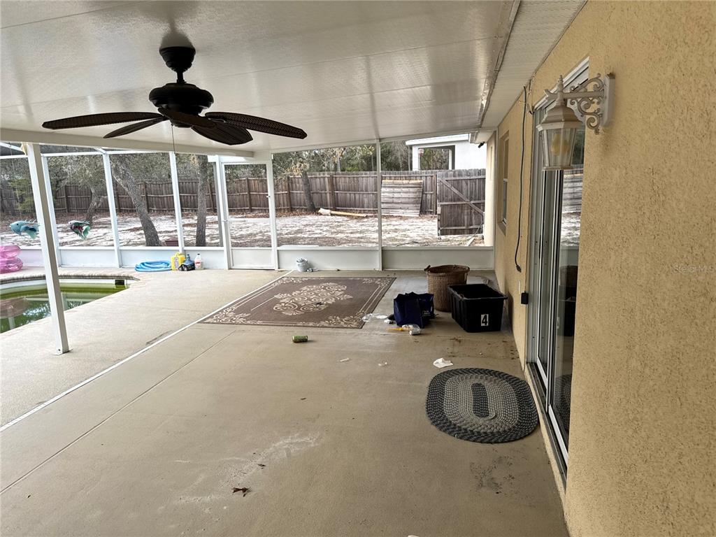 12055 Robina Road Weeki Wachee, FL 34614 - Photo 37 of 64 a view of a livingroom with a sink and dishwasher kitchen view