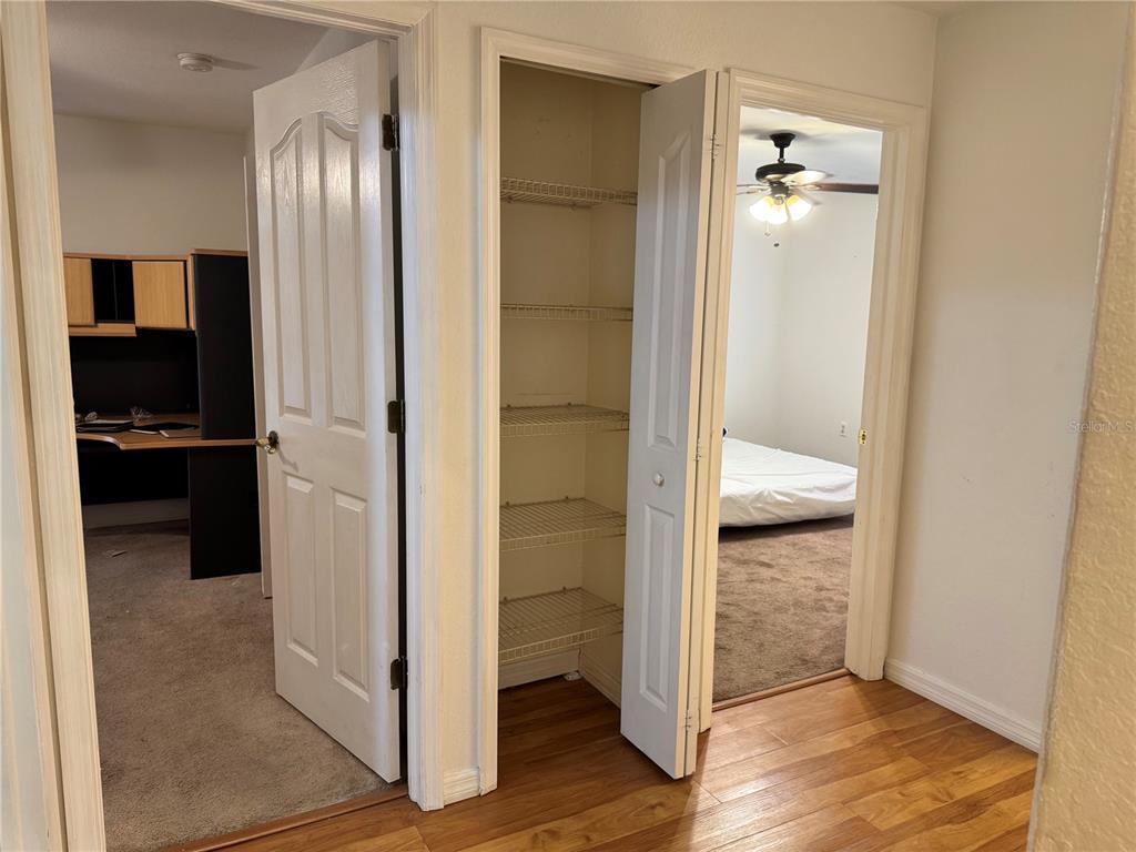 12055 Robina Road Weeki Wachee, FL 34614 - Photo 5 of 64 wooden floor in a gallery