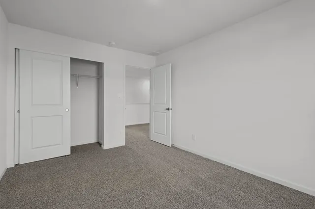 a view of a house with a yard porch and sitting area