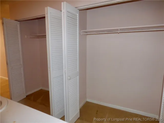 a bathroom with a toilet and a bathtub