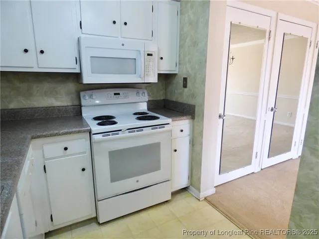 a view of a room with chandelier