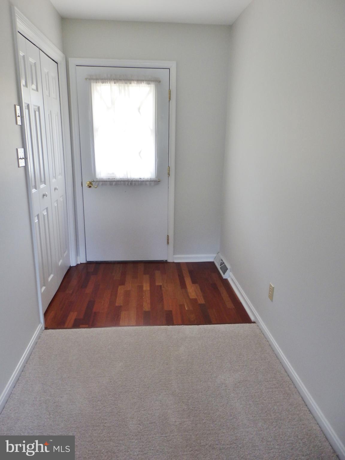 49945 Fenwick's Pride Lane Ridge, MD 20680 - Photo 13 of 64 Entry with Hardwood Floors