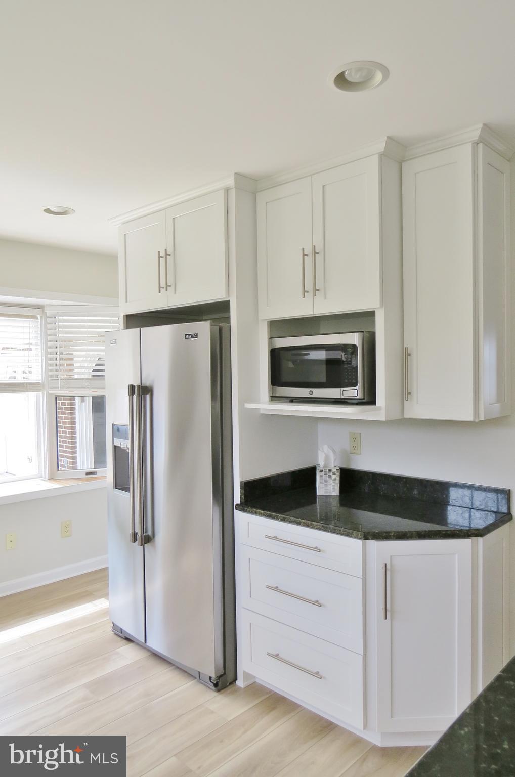 49945 Fenwick's Pride Lane Ridge, MD 20680 - Photo 27 of 64 NEW Corner Cabinets w/Micro & Recessed Lights