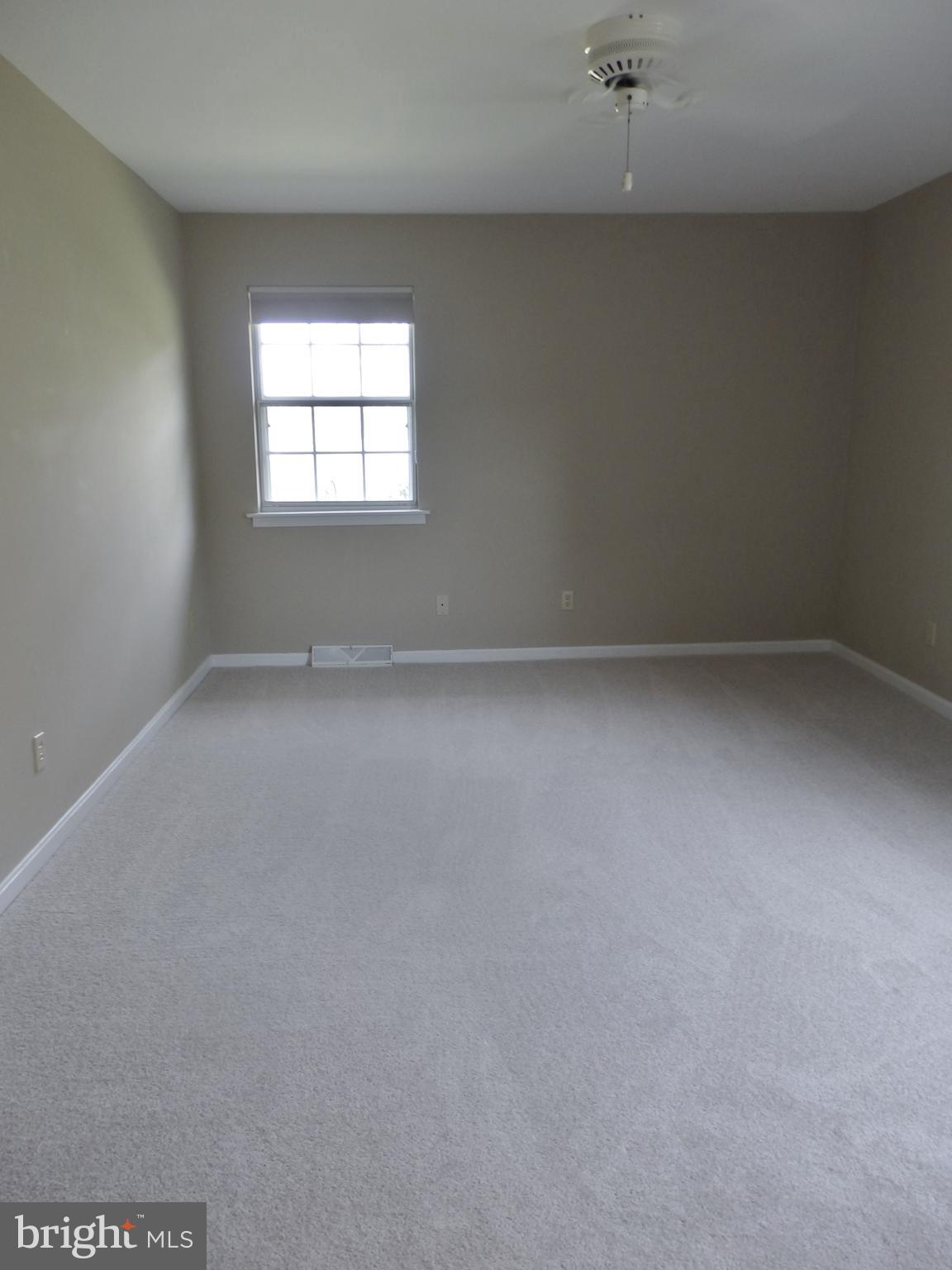 49945 Fenwick's Pride Lane Ridge, MD 20680 - Photo 37 of 64 Freshly Painted Master Bedroom