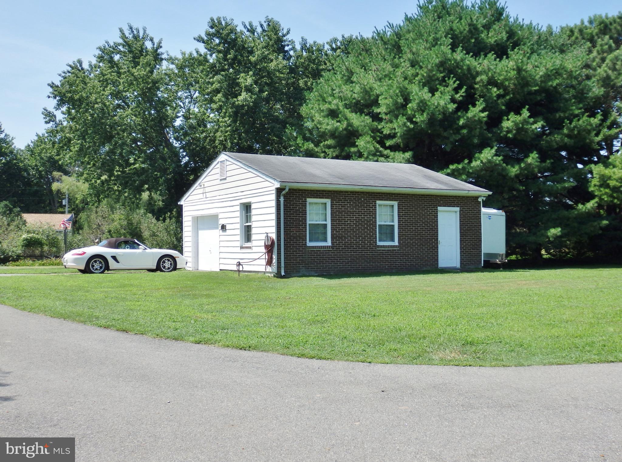 49945 Fenwick's Pride Lane Ridge, MD 20680 - Photo 59 of 64 Detached Garage/workshop w/30AMP inside and out
