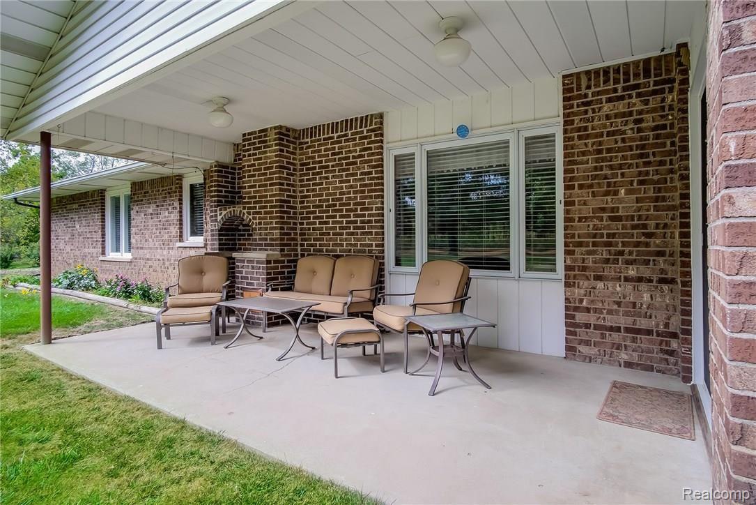 Covered back concrete patio for entertaining
