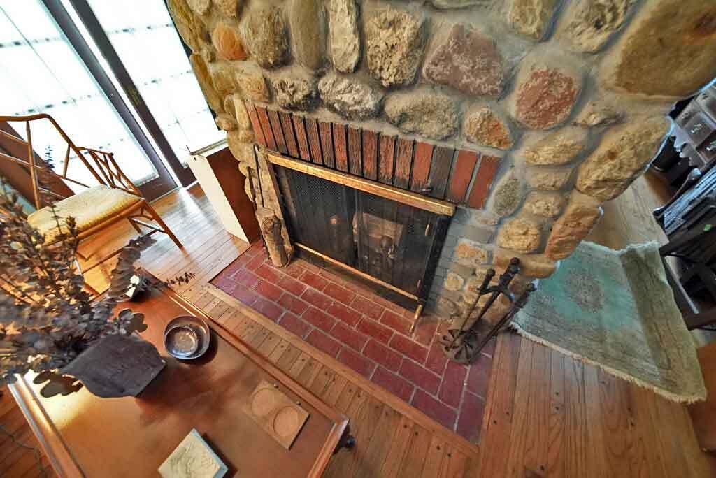 95 Sunset Park Road Orient, ME 04471 - Photo 23 of 66 center-stone-fireplace