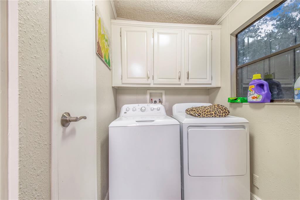 2747 Old Bartow Road Lake Wales, FL 33859 - Photo 11 of 30 a utility room with dryer and washer