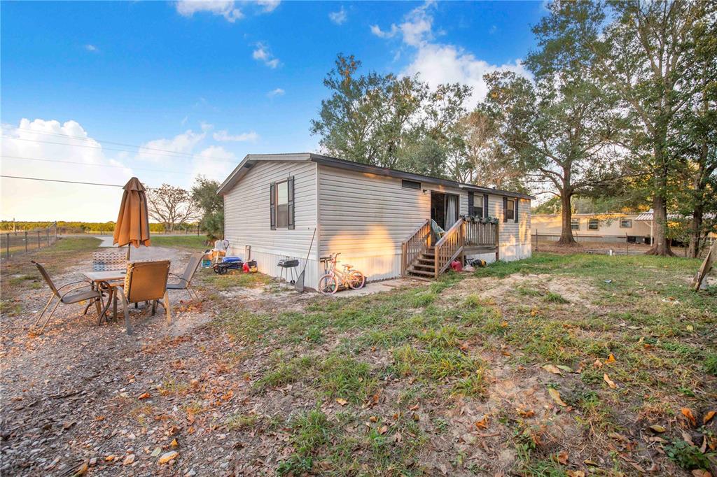 2747 Old Bartow Road Lake Wales, FL 33859 - Photo 20 of 30 a view of a house with backyard