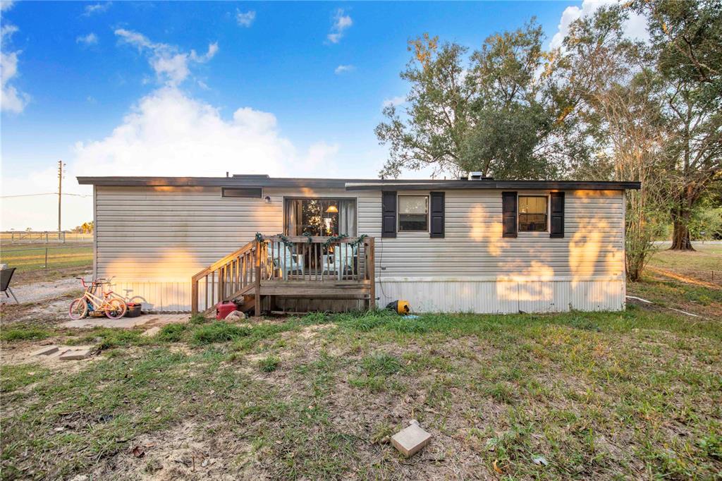 2747 Old Bartow Road Lake Wales, FL 33859 - Photo 22 of 30 a view of a house with backyard