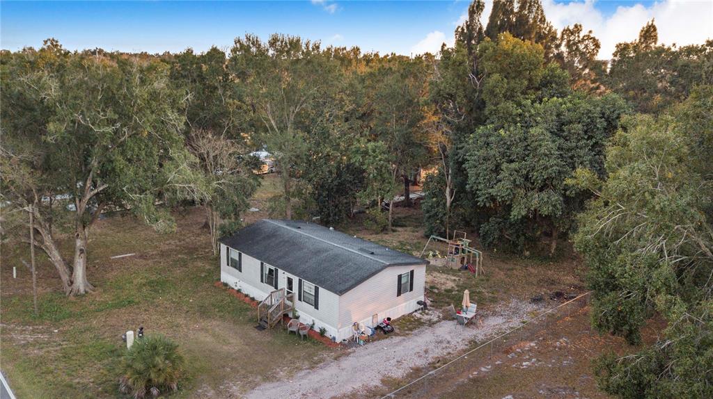 2747 Old Bartow Road Lake Wales, FL 33859 - Photo 26 of 30 a aerial view of a house with a yard