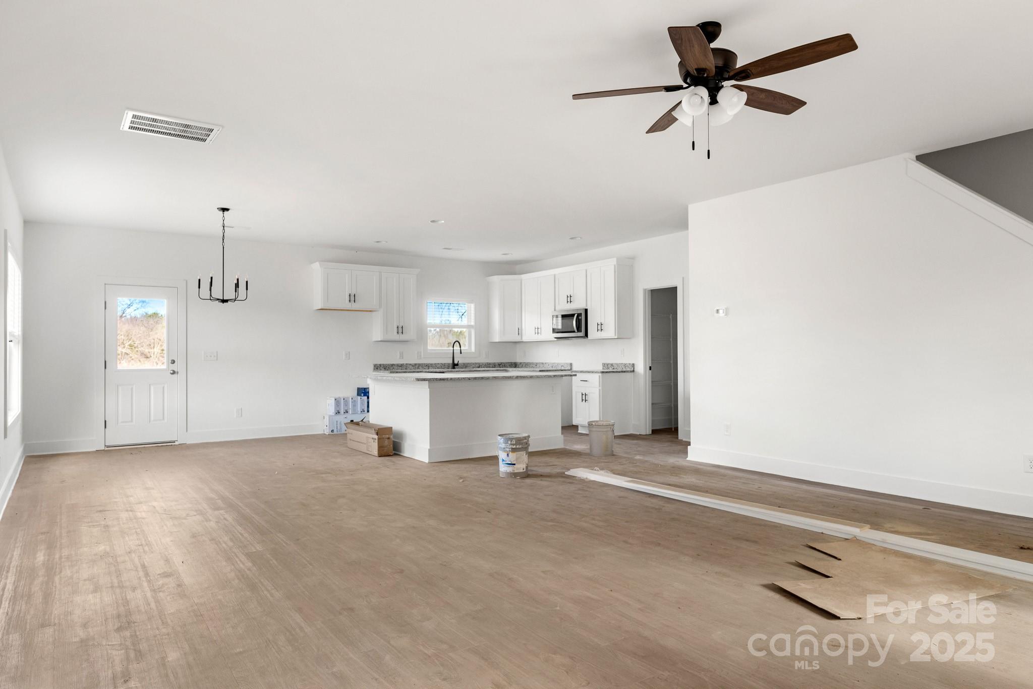 3309 Old Pageland Monroe Road Monroe, NC 28112 - Photo 4 of 37 a view of a kitchen with sink and refrigerator
