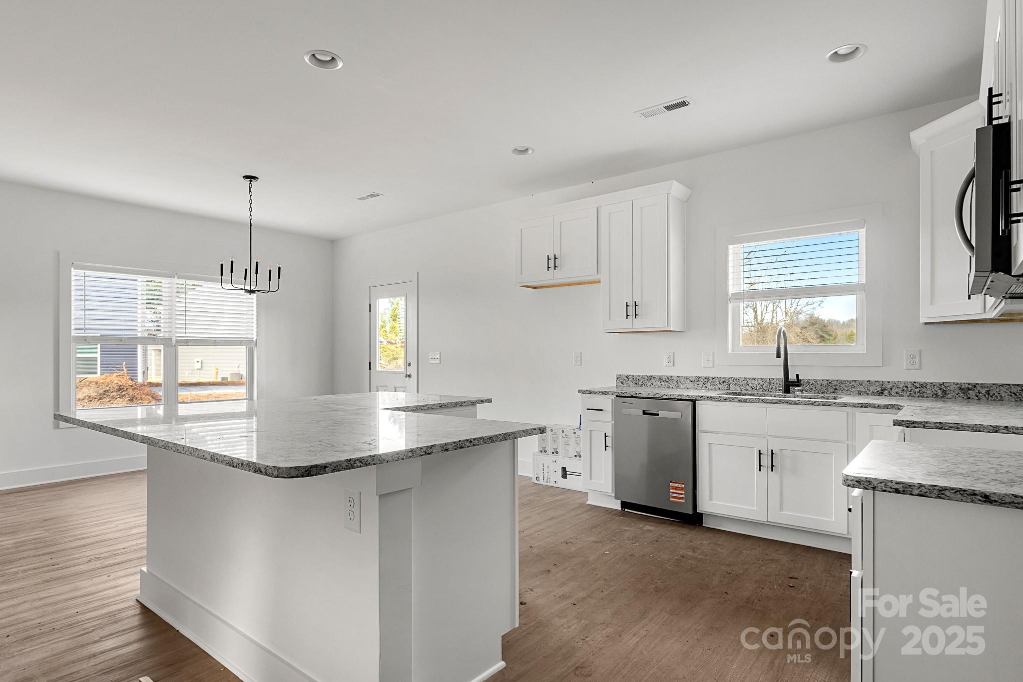 3309 Old Pageland Monroe Road Monroe, NC 28112 - Photo 10 of 37 a kitchen with sink stove and cabinets