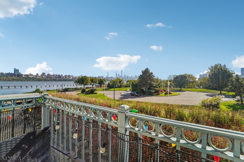 129 The Promenade Edgewater, NJ 07020 - Photo 15 of 17 a view of street from balcony