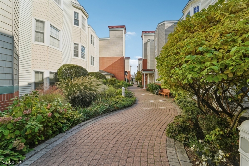 129 The Promenade Edgewater, NJ 07020 - Photo 17 of 17 a view of a garden with pathway