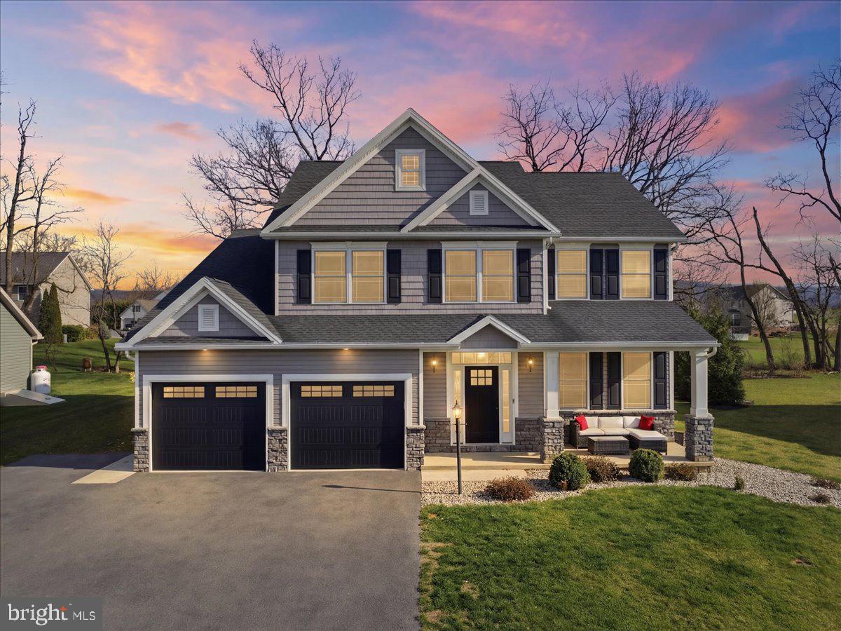 2006 Jelena Road Shippensburg, PA 17257 - Photo 2 of 47 a front view of a house with a yard