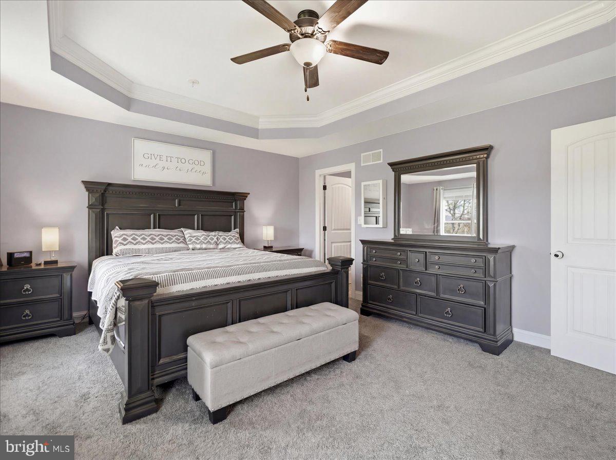 2006 Jelena Road Shippensburg, PA 17257 - Photo 22 of 47 a bedroom with a bed and a chandelier