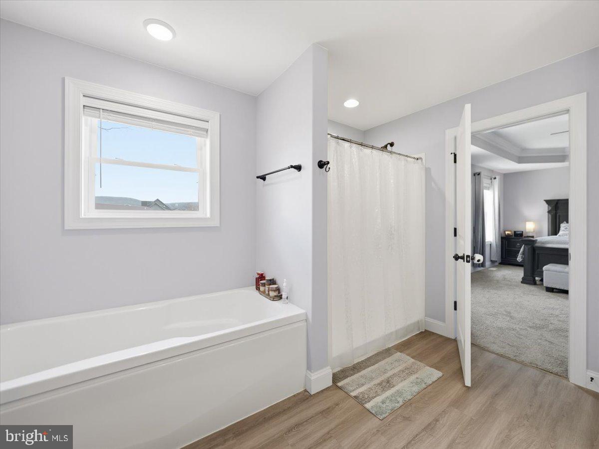 2006 Jelena Road Shippensburg, PA 17257 - Photo 26 of 47 a bathroom with a tub a toilet and a shower