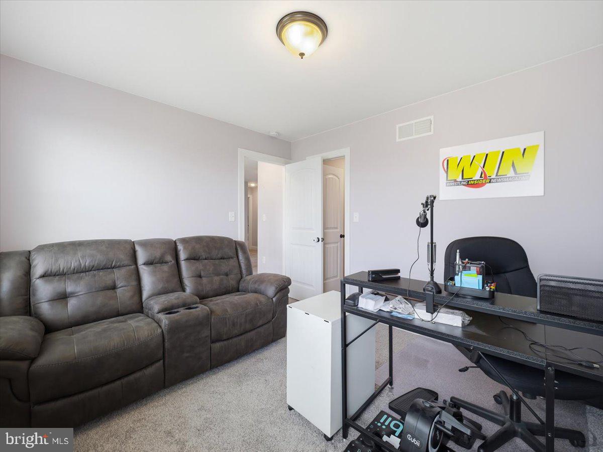 2006 Jelena Road Shippensburg, PA 17257 - Photo 34 of 47 a living room with furniture and a couch