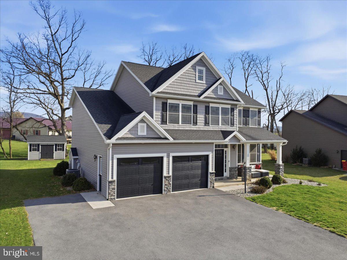 2006 Jelena Road Shippensburg, PA 17257 - Photo 4 of 47 a front view of a house with a yard