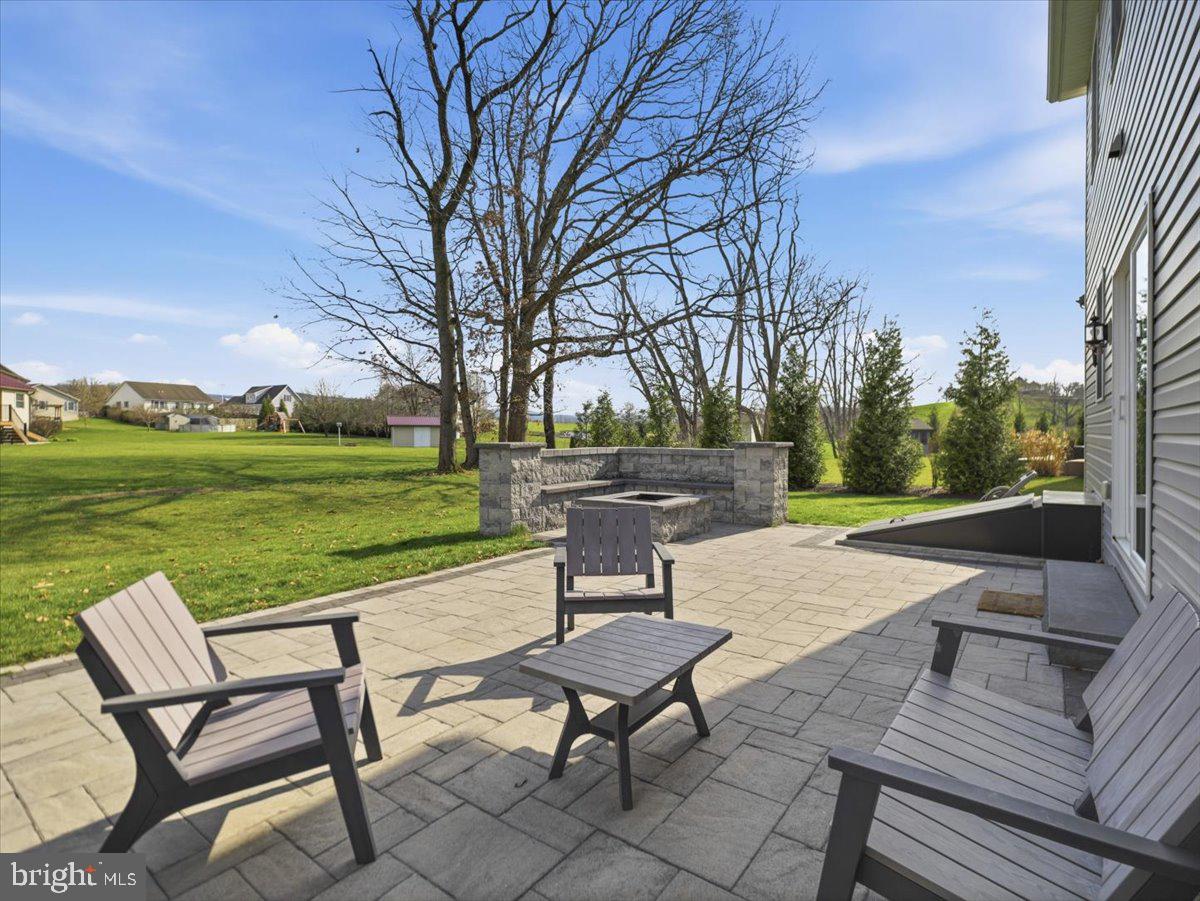 2006 Jelena Road Shippensburg, PA 17257 - Photo 42 of 47 a view of a lake with table and chairs and floor to ceiling window